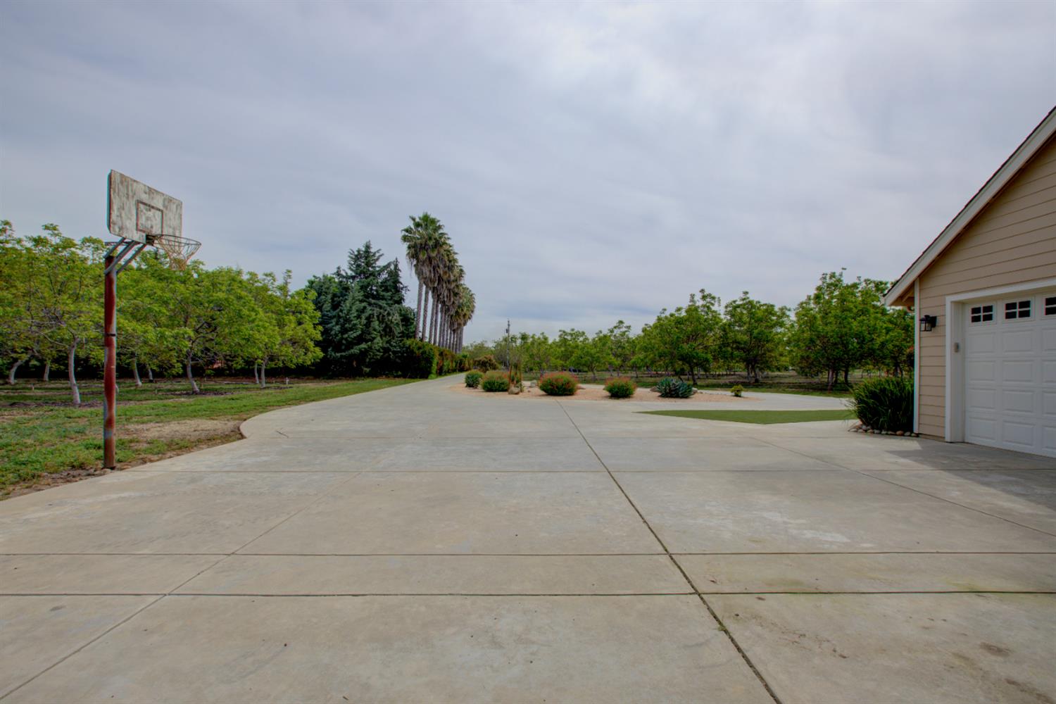 1054 Townhill Road Oakdale, CA 95361 - Photo 42 of 60 a view of a road with a building in the background
