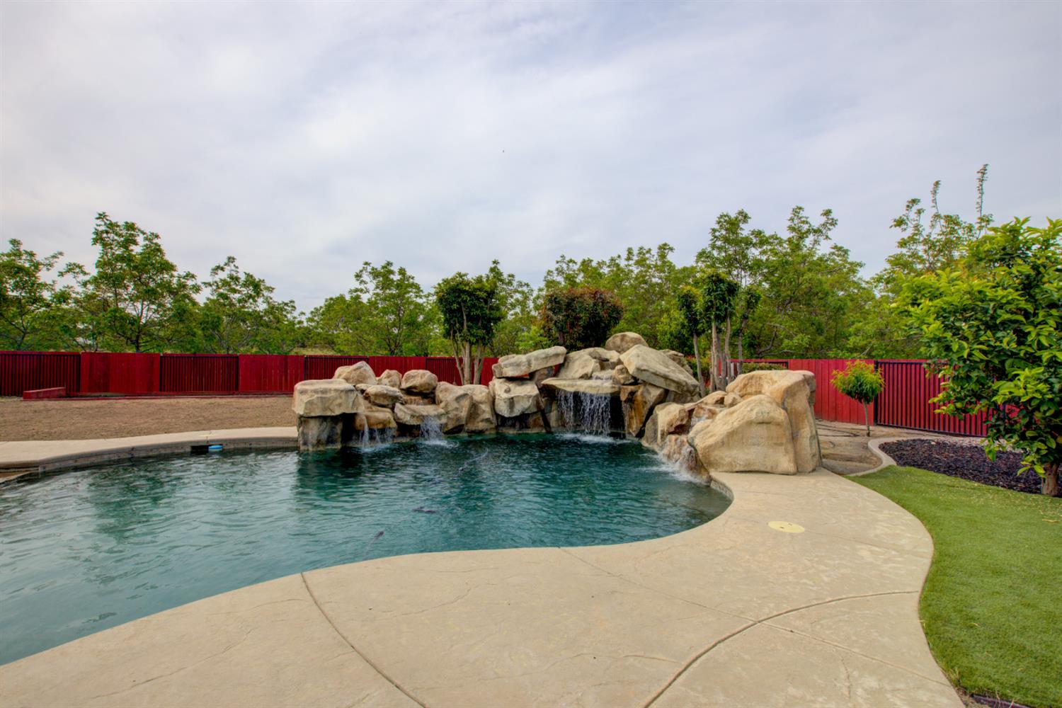 1054 Townhill Road Oakdale, CA 95361 - Photo 49 of 60 a view of swimming pool with seating space