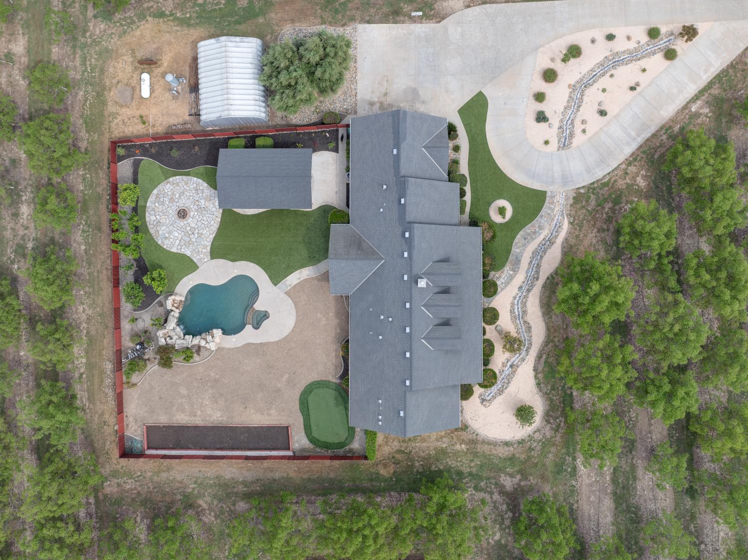 1054 Townhill Road Oakdale, CA 95361 - Photo 59 of 60 an aerial view of a house with garden space sitting space