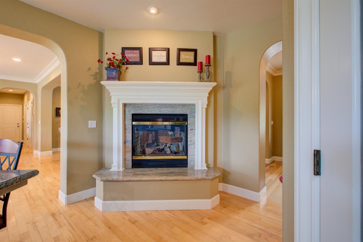 1054 Townhill Road Oakdale, CA 95361 - Photo 6 of 60 a living room with furniture and a fireplace