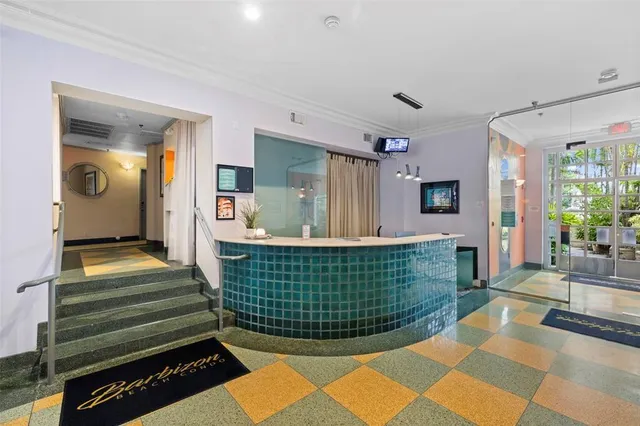 a view of a bedroom with washer and dryer
