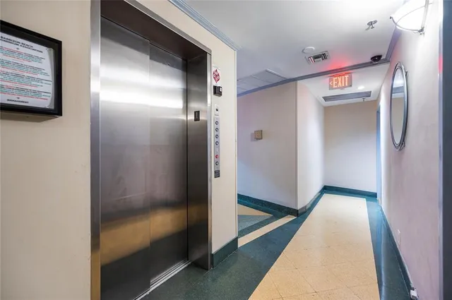a view of a road with an ocean view