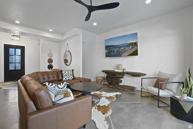 4346 Canterbury Road Hurricane, UT 84737 - Photo 10 of 37 Living room featuring finished concrete floors, recessed lighting, and ceiling fan