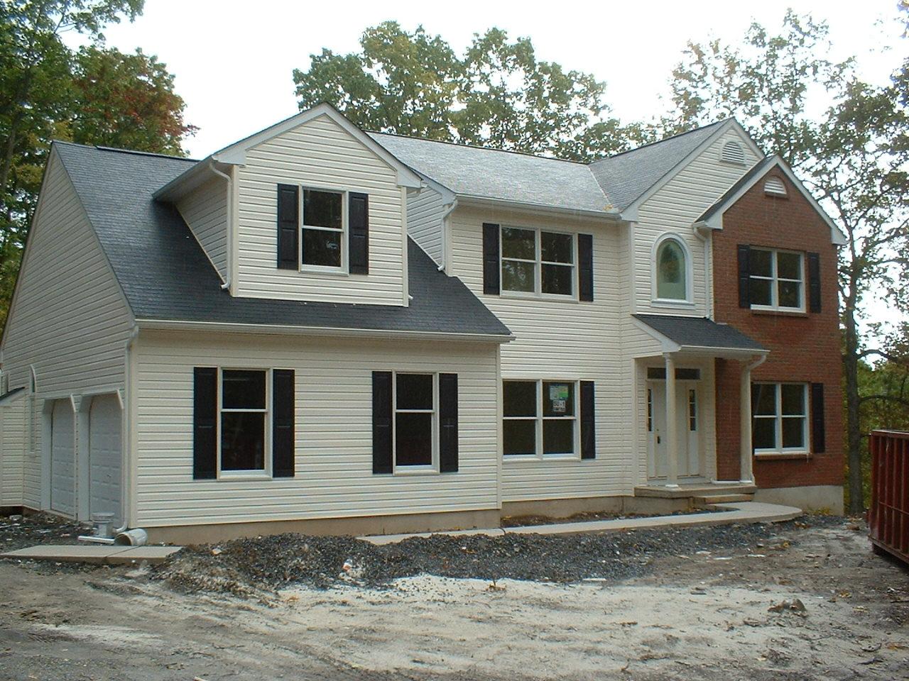 1 Summit Road Swiftwater, PA 18370 - Photo 1 of 3 a front view of a house with a yard