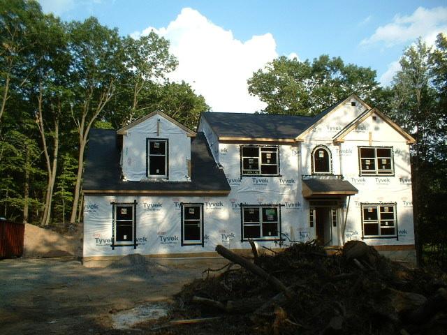 1 Summit Road Swiftwater, PA 18370 - Photo 2 of 3 a front view of a house with a yard