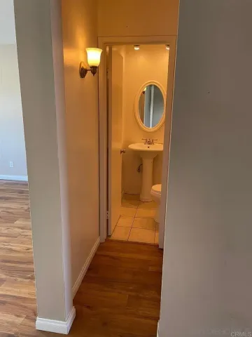 a view of a bathroom with a sink and a washer