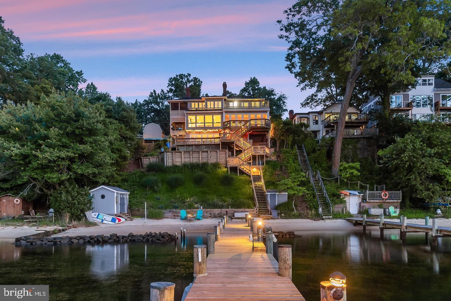 a view of a lake with a house in the background
