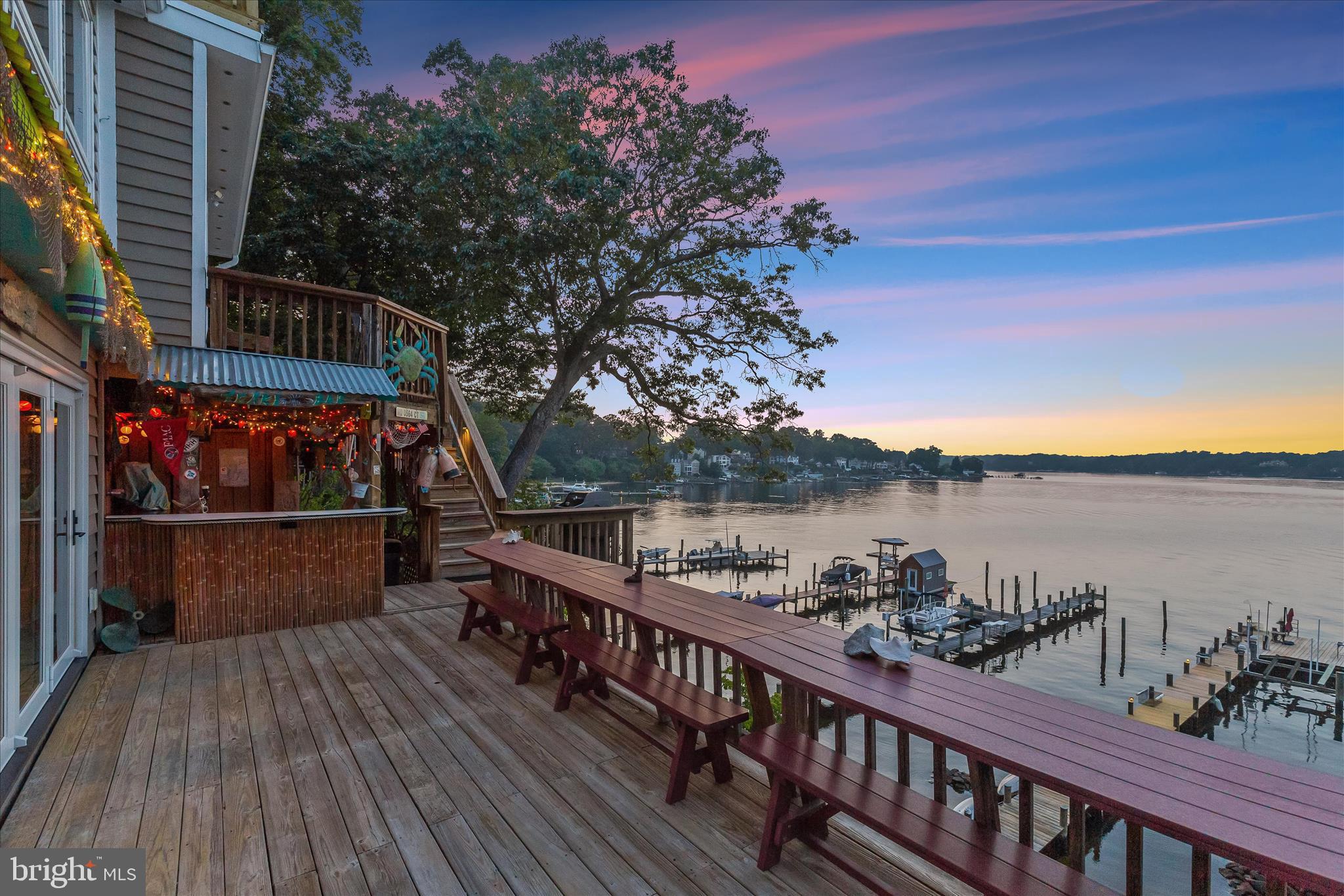 330 South Riverside Drive Crownsville, MD 21032 - Photo 108 of 137 a view of a balcony with wooden floor and fence