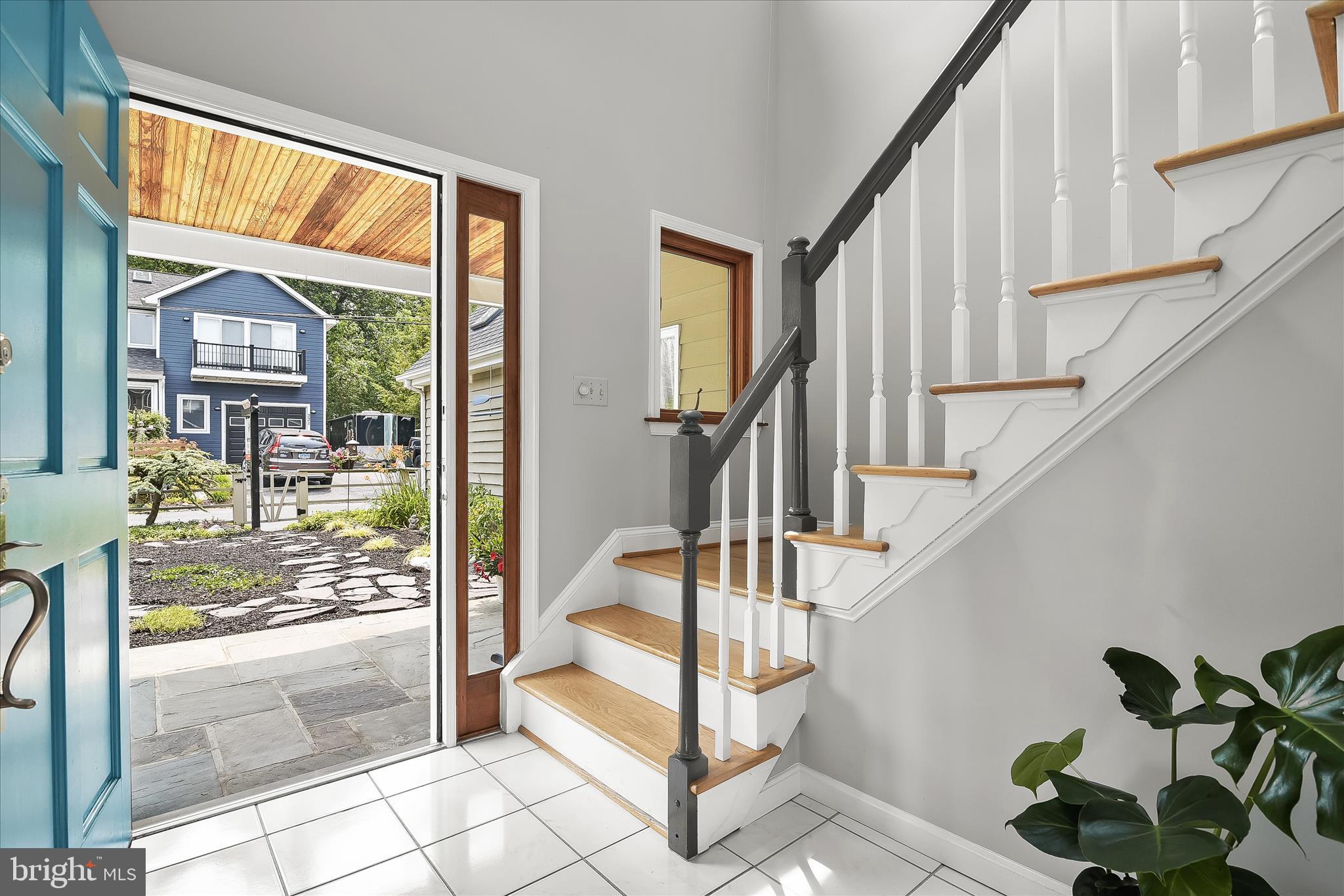 330 South Riverside Drive Crownsville, MD 21032 - Photo 12 of 137 a view of an entryway with wooden floor and door