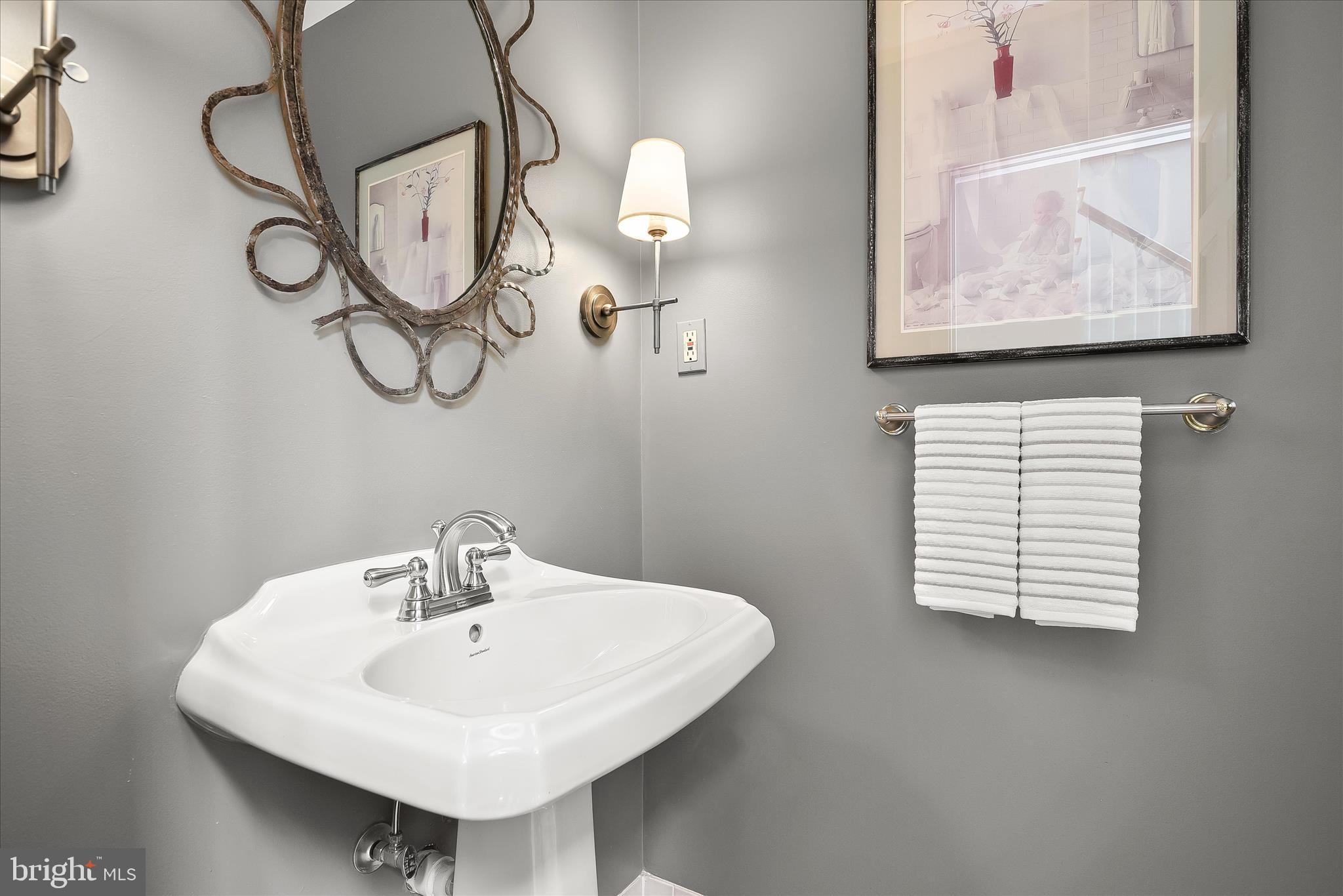 330 South Riverside Drive Crownsville, MD 21032 - Photo 14 of 137 a bathroom with a sink and a mirror