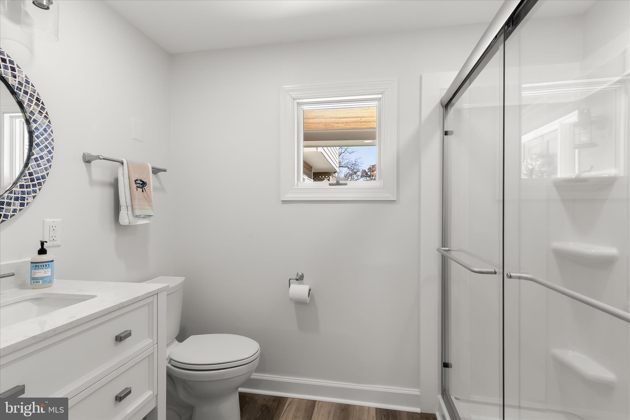 330 South Riverside Drive Crownsville, MD 21032 - Photo 50 of 137 a bathroom with a granite countertop toilet a sink and a mirror