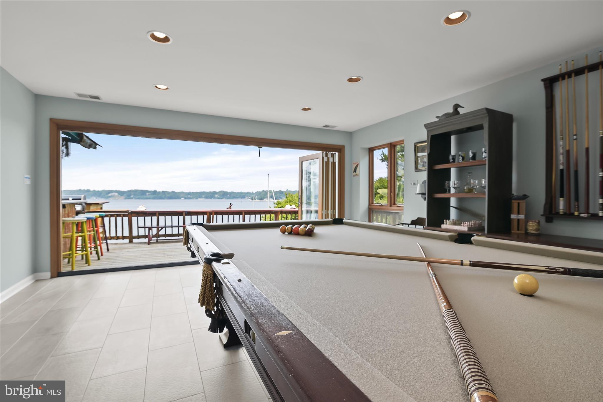 330 South Riverside Drive Crownsville, MD 21032 - Photo 72 of 137 a view of a kitchen with a large window and furniture