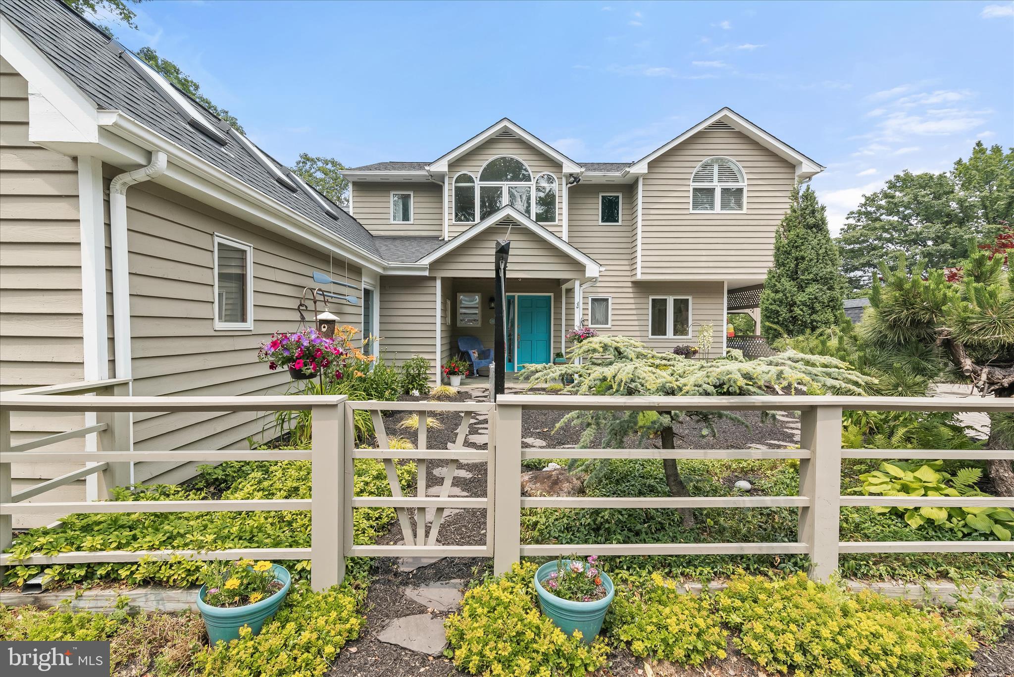 330 South Riverside Drive Crownsville, MD 21032 - Photo 8 of 137 a front view of a house with a garden