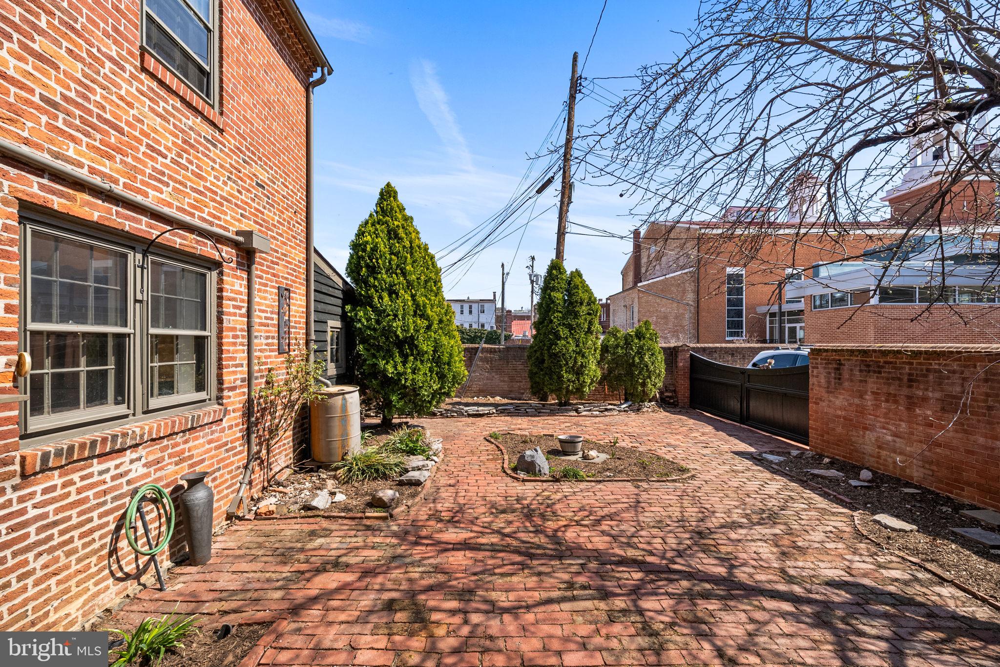 106 North Court Street Frederick, MD 21701 - Photo 25 of 34 a view of a house with a patio