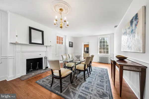 a view of a livingroom with furniture and a fireplace
