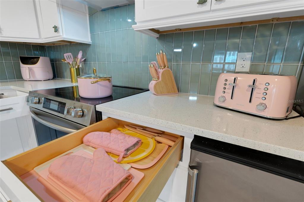 8390 Little Gasparilla Placida, FL 33946 - Photo 15 of 81 a kitchen with stainless steel appliances granite countertop a sink and a stove