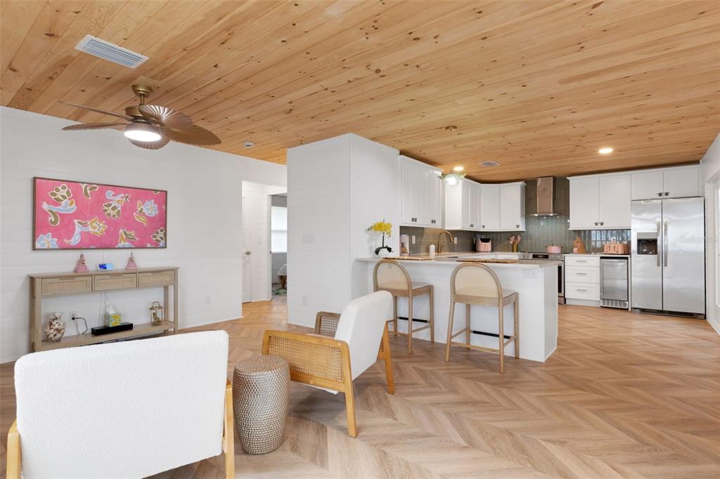 8390 Little Gasparilla Placida, FL 33946 - Photo 2 of 81 a living room with furniture and kitchen view