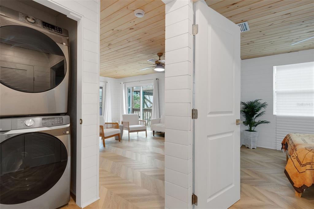 8390 Little Gasparilla Placida, FL 33946 - Photo 24 of 81 a view of a hallway with washer and dryer
