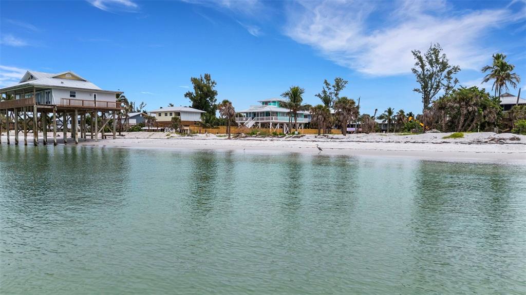 8390 Little Gasparilla Placida, FL 33946 - Photo 79 of 81 a view of a lake with houses