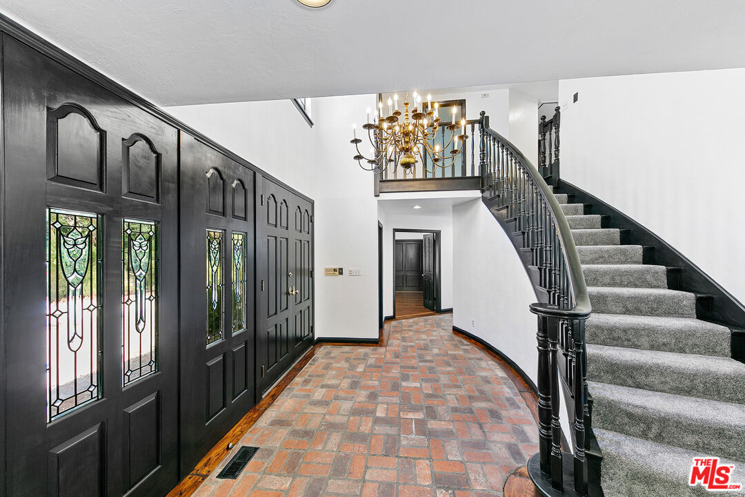 29528 Harvester Road Malibu, CA 90265 - Photo 22 of 36 a view of entryway and hall with wooden floor