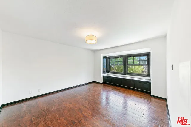 a view of a living room and window