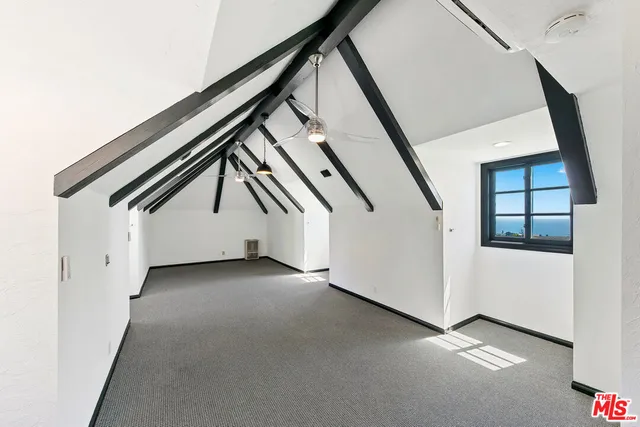 a view of a house with a street