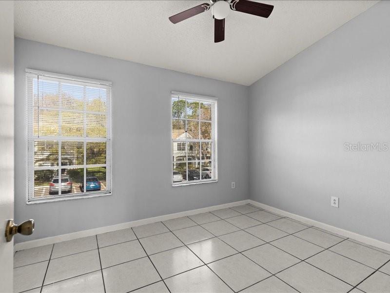29924 Playa Del Rey Lane Wesley Chapel, FL 33543 - Photo 14 of 31 a view of an empty room with a window