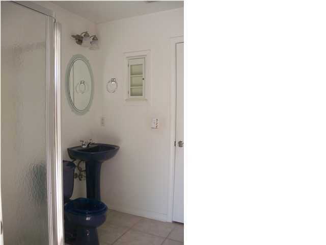 1364 Driftwood Point Road Santa Rosa Beach, FL 32459 - Photo 11 of 32 a view of a hallway with door