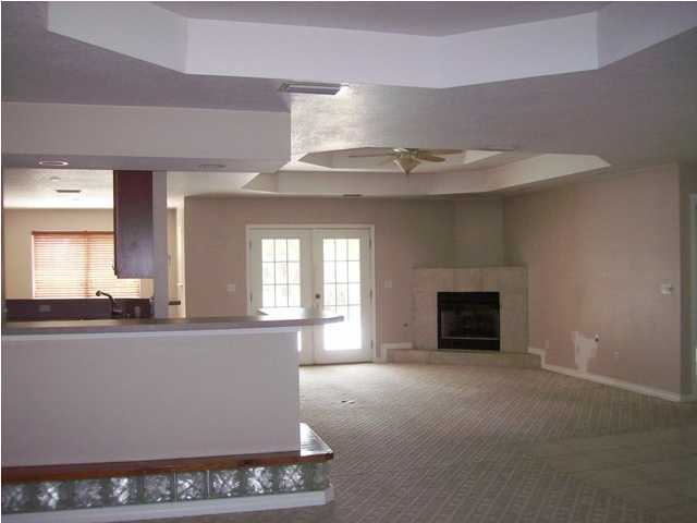 1364 Driftwood Point Road Santa Rosa Beach, FL 32459 - Photo 19 of 32 a large kitchen with granite countertop a stove top oven a sink and dishwasher