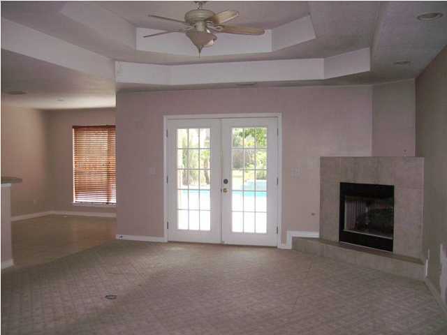 1364 Driftwood Point Road Santa Rosa Beach, FL 32459 - Photo 3 of 32 a view of empty room with a fireplace