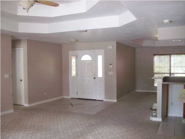1364 Driftwood Point Road Santa Rosa Beach, FL 32459 - Photo 10 of 32 an empty room with windows and closet