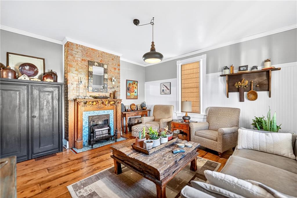 722 8th Street Irwin, PA 15642 - Photo 11 of 50 a living room with furniture fireplace and a flat screen tv