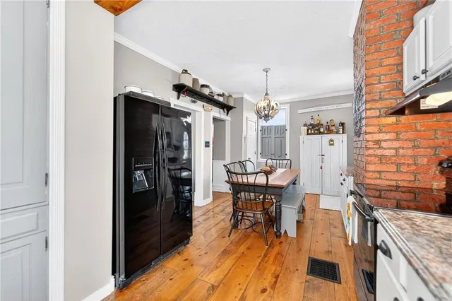 a view of a kitchen from a dining room
