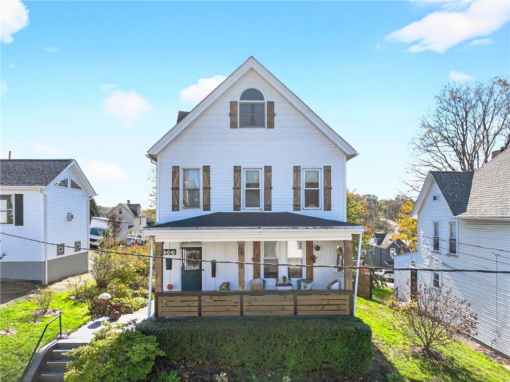 722 8th Street Irwin, PA 15642 - Photo 2 of 50 a front view of a house with a yard