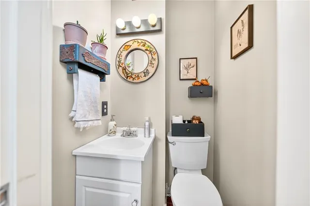 a bathroom with a toilet and a sink