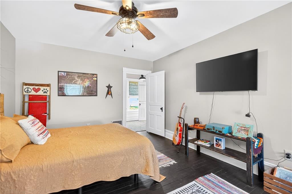 722 8th Street Irwin, PA 15642 - Photo 28 of 50 a bedroom with a bed and a flat screen tv