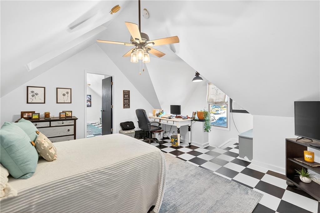 722 8th Street Irwin, PA 15642 - Photo 35 of 50 a very nice looking room with a large bed and a chandelier