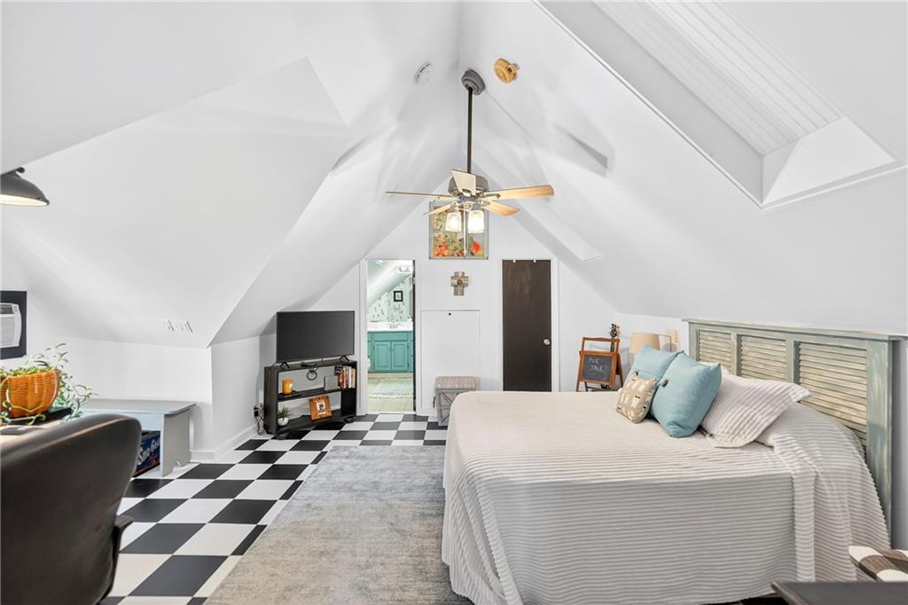 722 8th Street Irwin, PA 15642 - Photo 37 of 50 a bedroom with a bed and a tv