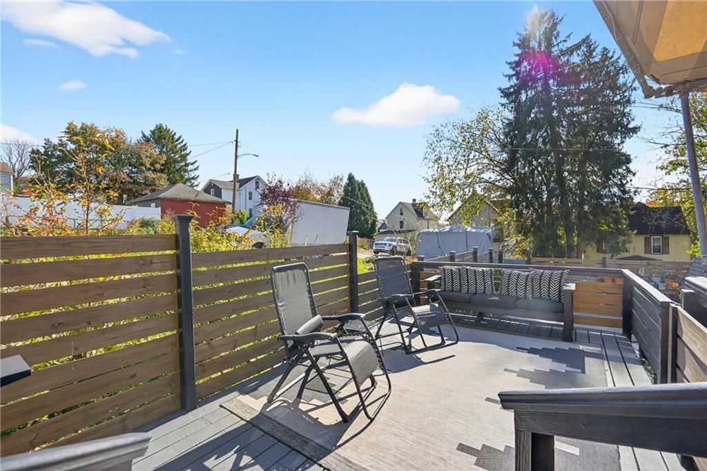 722 8th Street Irwin, PA 15642 - Photo 42 of 50 a view of a patio with a table and chairs