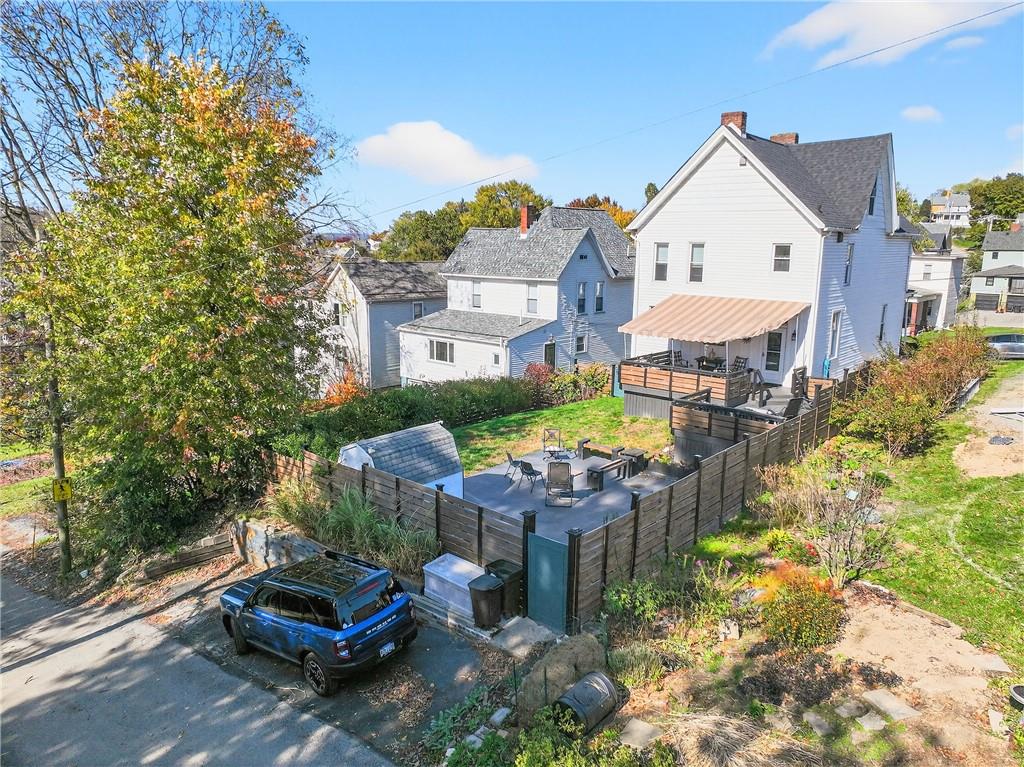 722 8th Street Irwin, PA 15642 - Photo 48 of 50 a front view of a house with a garden and lake view