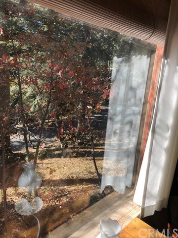 933 Oak Road Skyforest, CA 92385 - Photo 15 of 31 a view of balcony with wooden floor