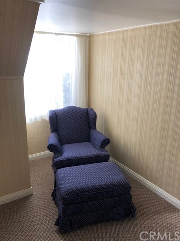 933 Oak Road Skyforest, CA 92385 - Photo 20 of 31 a blue bed sitting in a bedroom next to a window