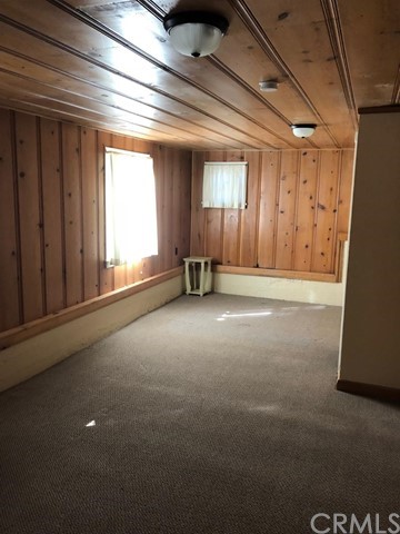 933 Oak Road Skyforest, CA 92385 - Photo 25 of 31 a view of an empty room with a window