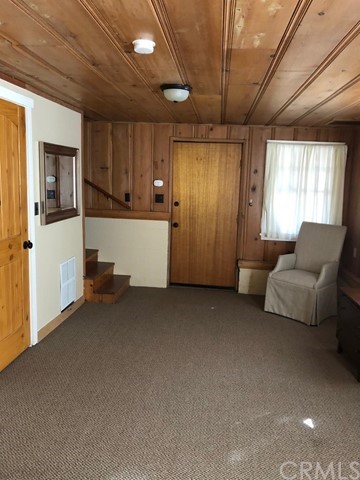 933 Oak Road Skyforest, CA 92385 - Photo 26 of 31 a living room with furniture and a couch