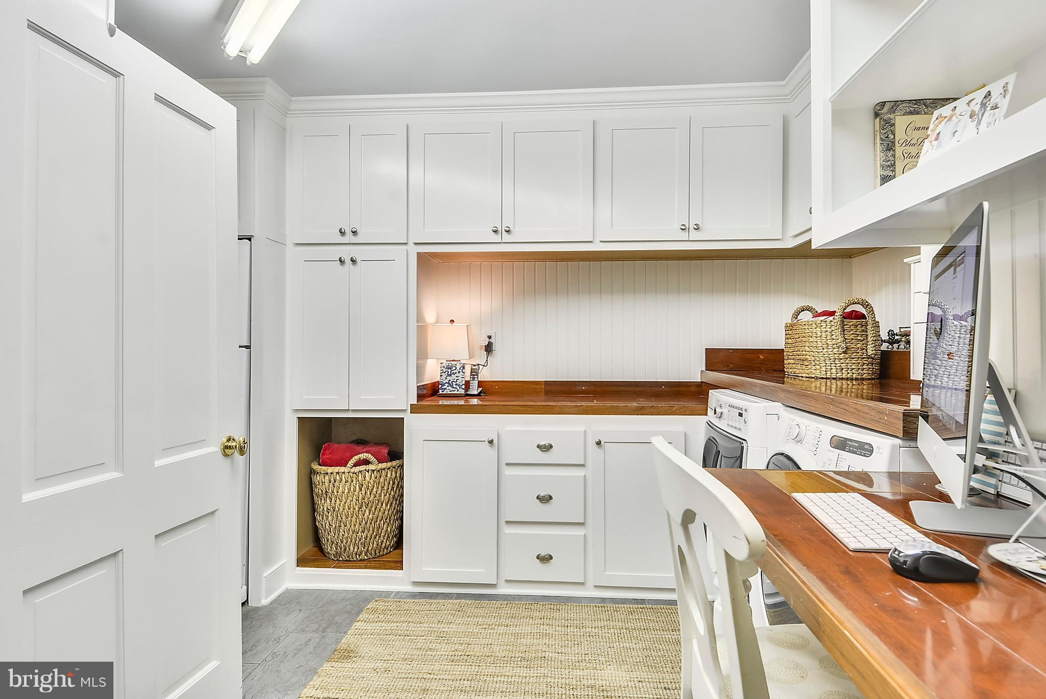 27908 Waverly Road Easton, MD 21601 - Photo 22 of 28 Utility room with front loading washer & dryer