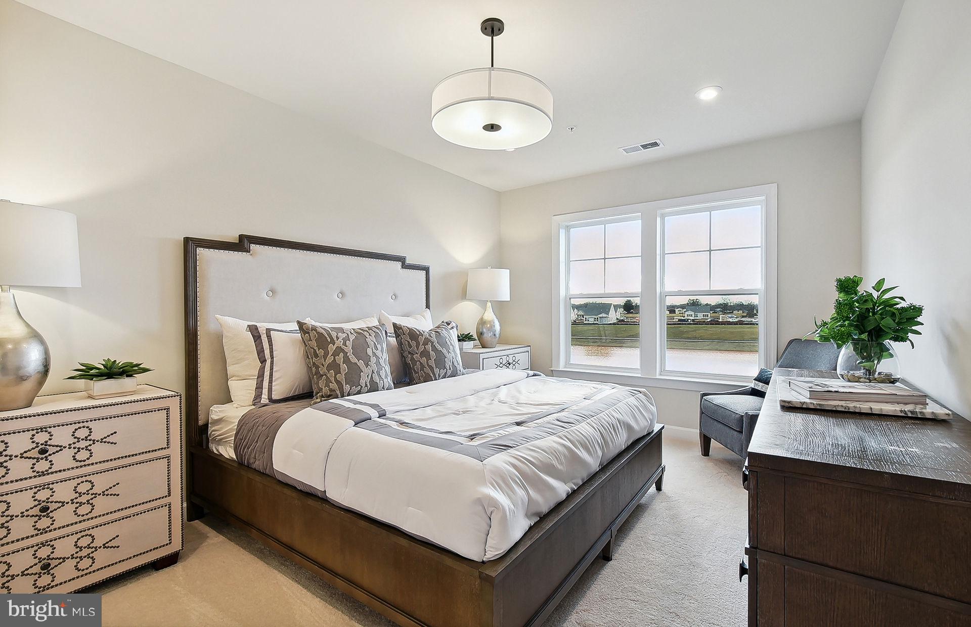 5800 Moonstone Way, Unit 2 Haymarket, VA 20169 - Photo 7 of 35 a bedroom with bed and window