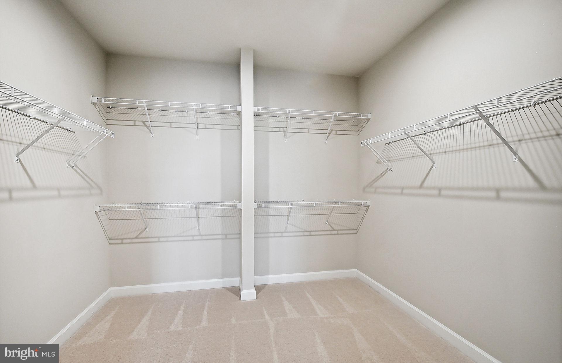 5800 Moonstone Way, Unit 2 Haymarket, VA 20169 - Photo 9 of 35 a view of a room with racks on the wall