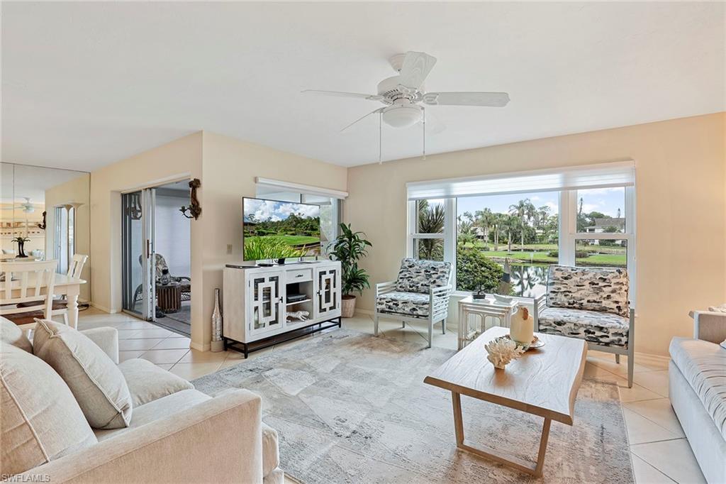 84 Georgetown Boulevard, Unit 84 Naples, FL 34112 - Photo 1 of 17 Living Area with Lake View