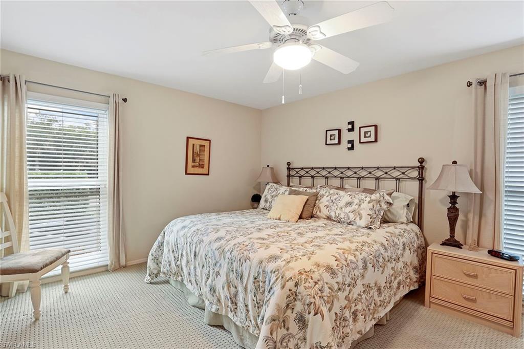 84 Georgetown Boulevard, Unit 84 Naples, FL 34112 - Photo 9 of 17 Primary Bedroom with King Bed