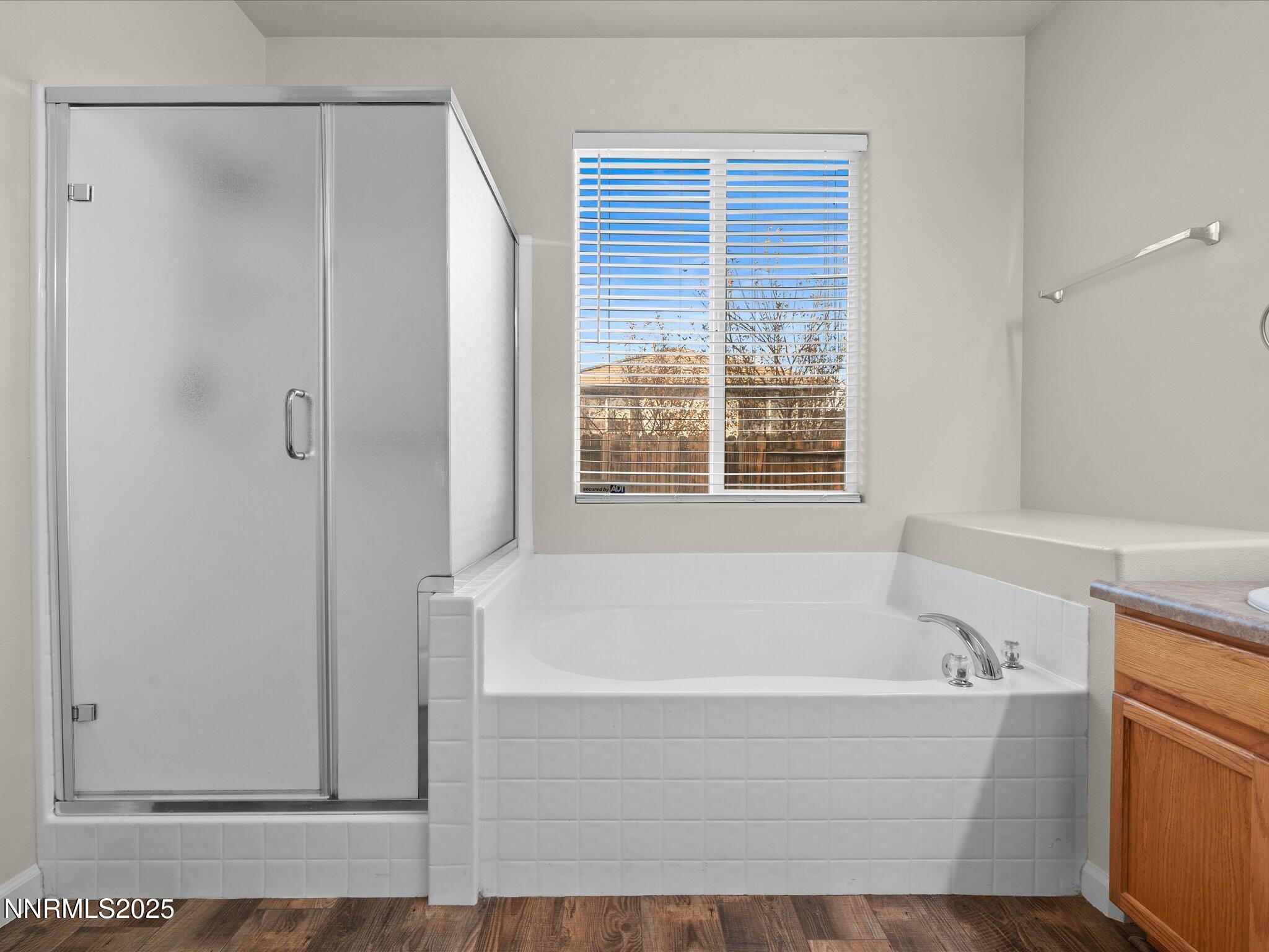 10873 Rushing Flume Drive Reno, NV 89521 - Photo 19 of 37 a white bath tub sitting next to a window